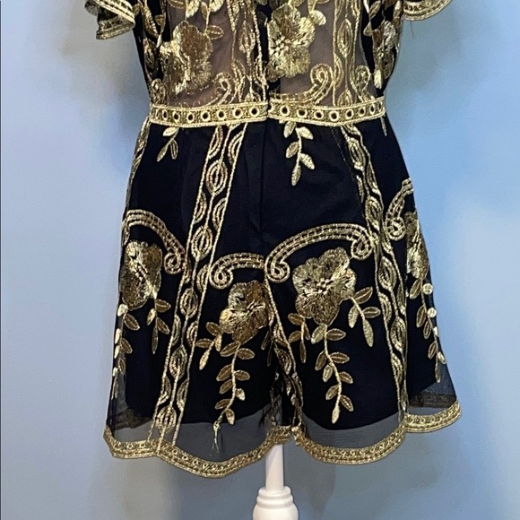 Elegant Black and Gold Romper with Modern Flair Size Medium - Picture 9 of 12